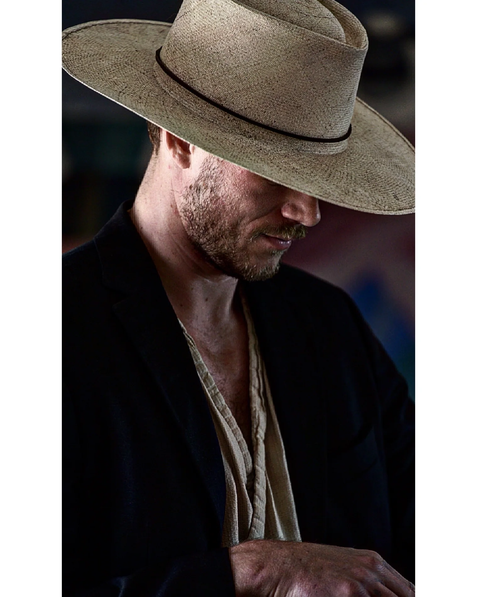 Artist Jeff Lee wearing a wide-brimmed hat