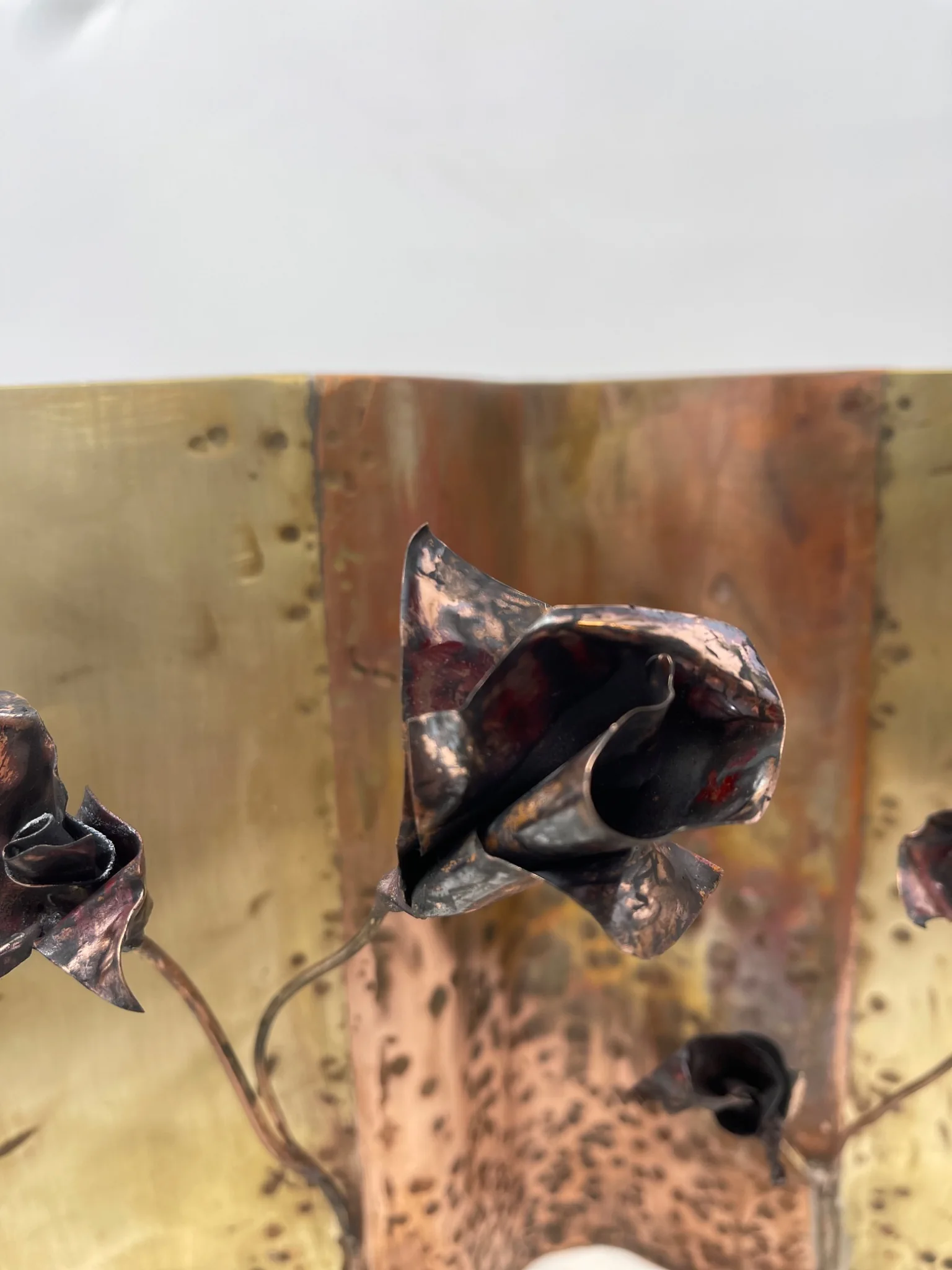 Detail of a hand-formed copper flower